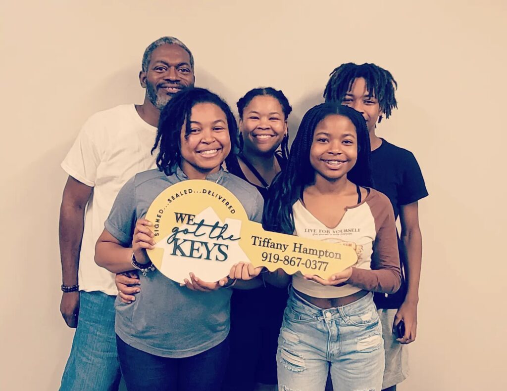 group of 5 people who just bought a home