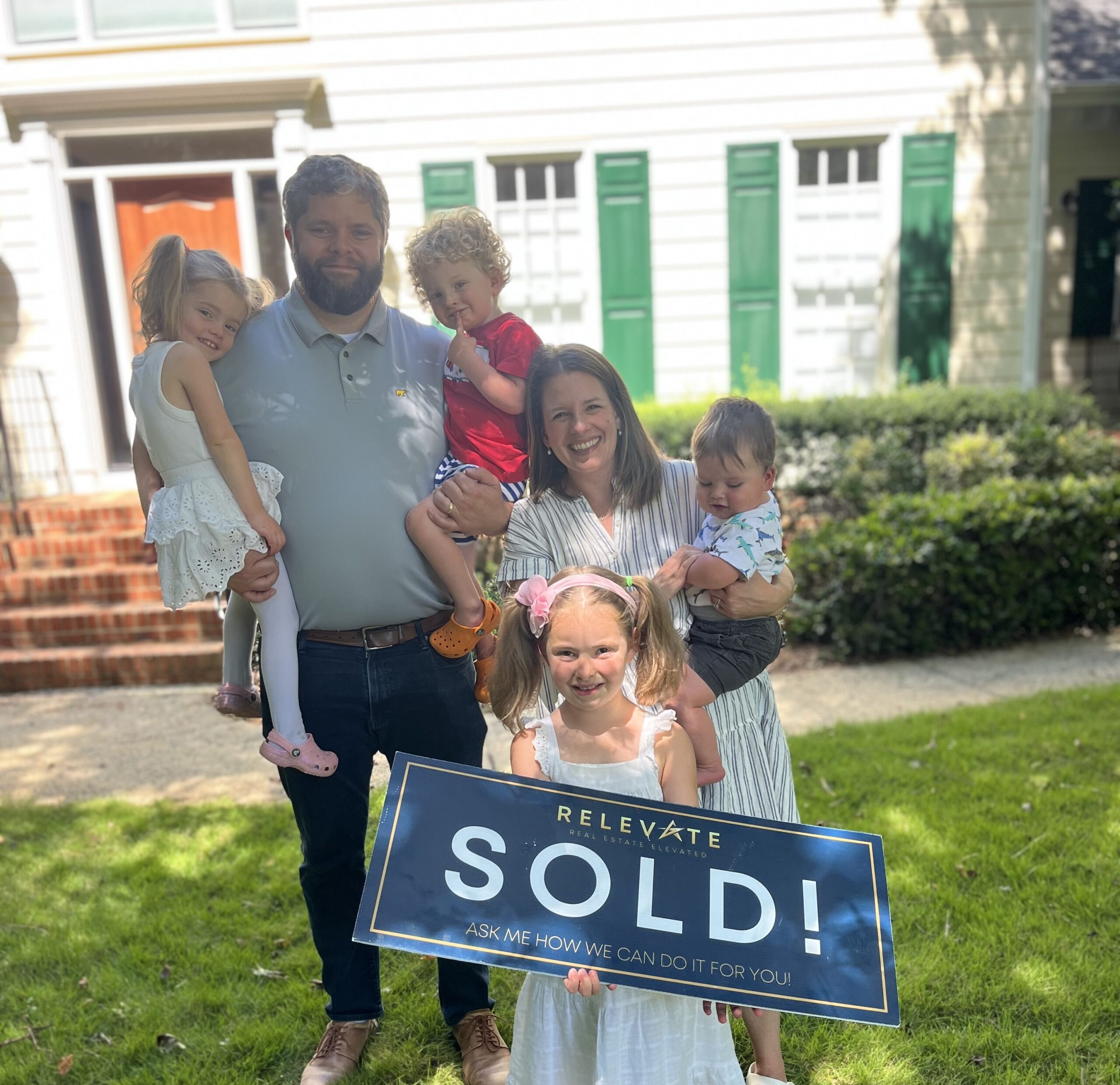 Happy family who just bought a house.